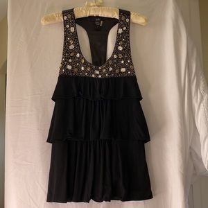 Rain tank top with ruffle and beaded top. Black